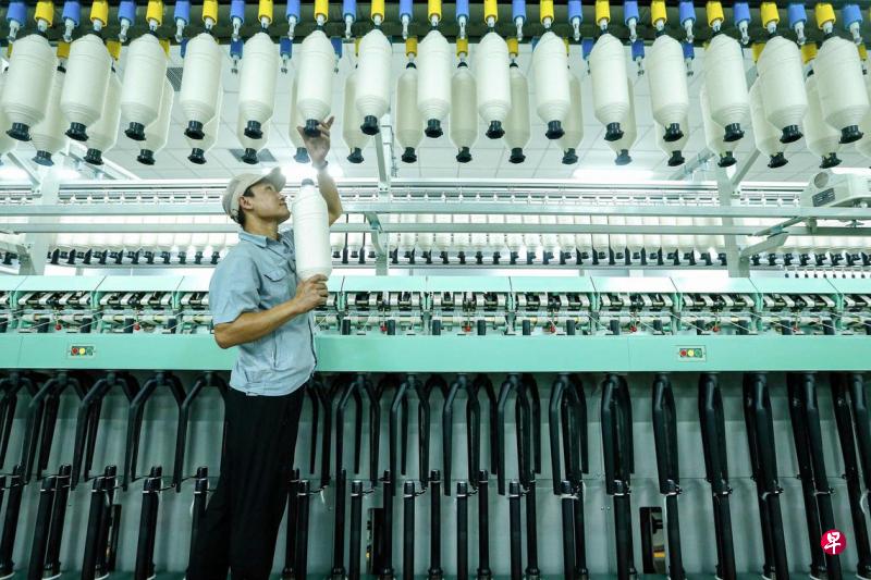 CHINA-ECONOMY-085703_0.jpg